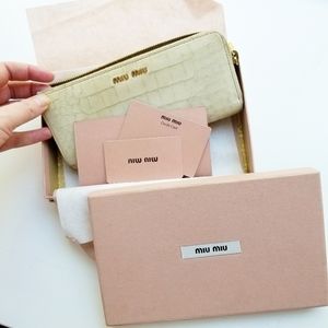 MIU MIU long wallet leather zipper clutch
